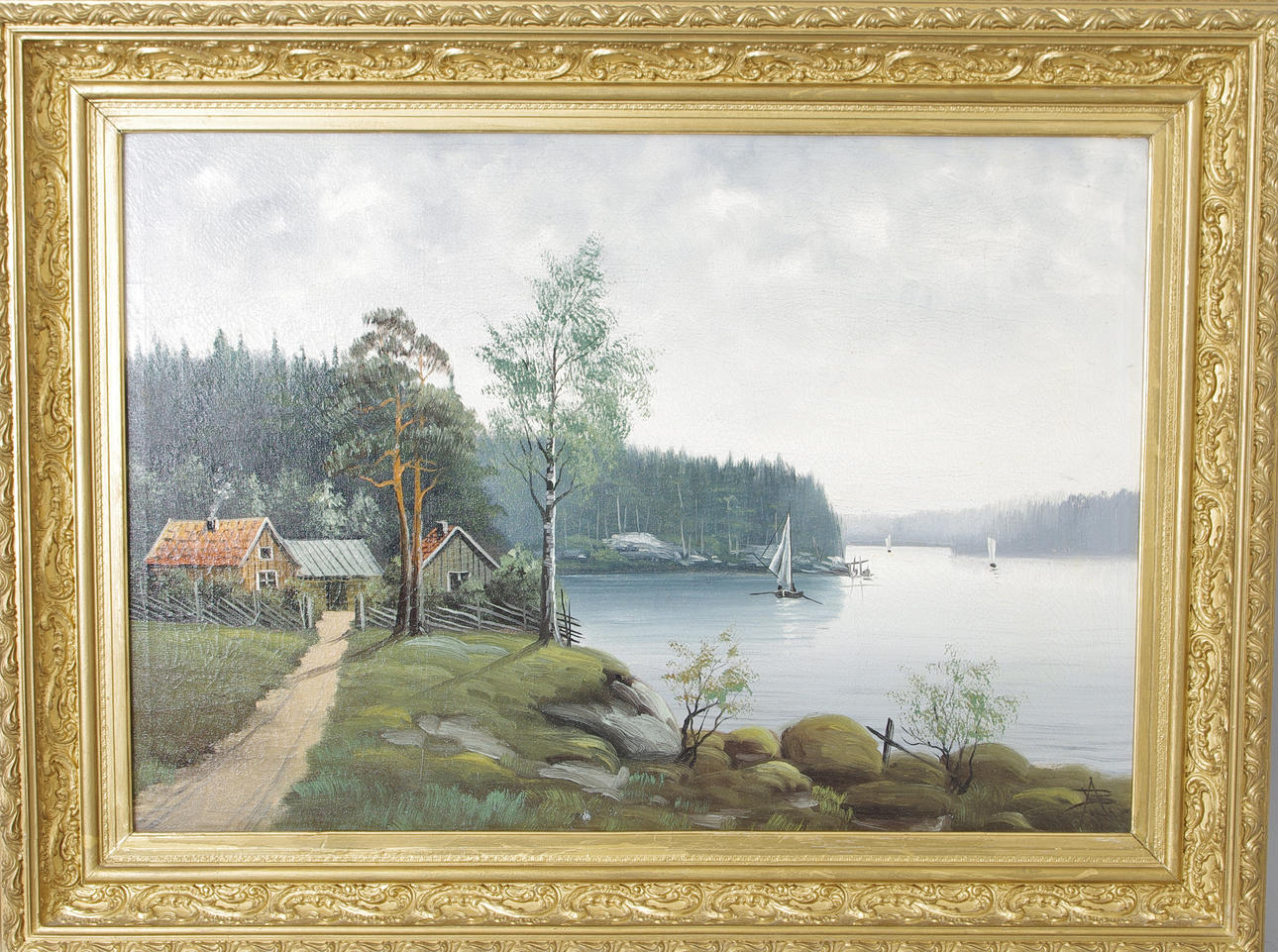 OIDENTIFIERAD KONSTNÄR. sjölandskap med hus, olja på duk, sekelskiftet 1800/1900, monogramsignerad.