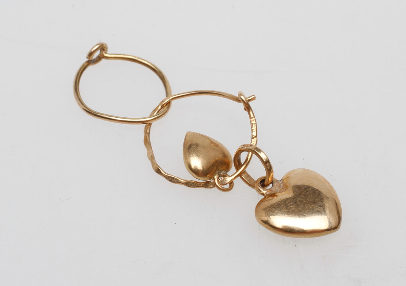 GULDSMYCKEN, 18k guld, 1 gr.