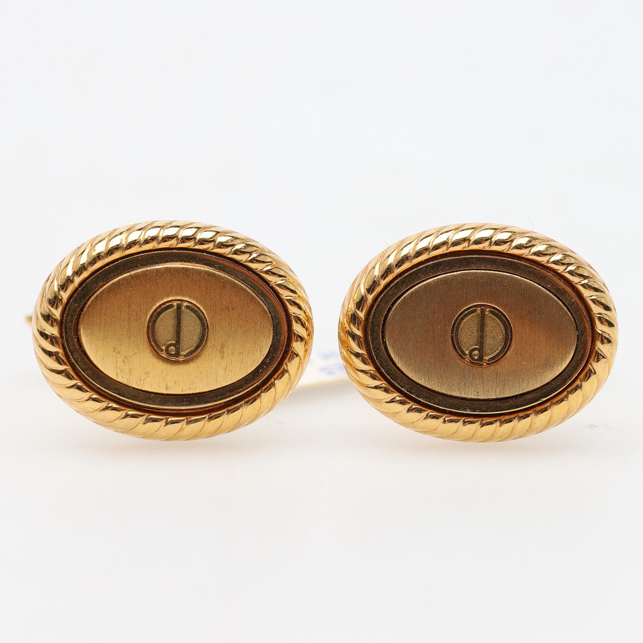 DUNHILL. gemelos, metal común.