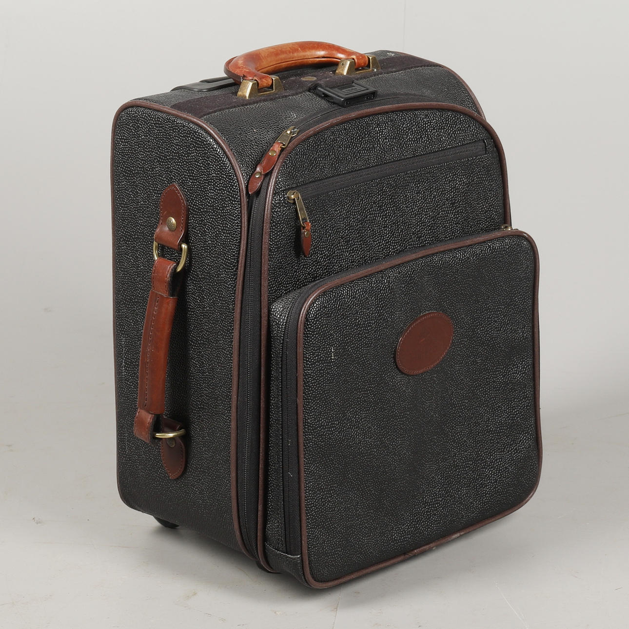 A MULBERRY BLACK SCOTCH GRAIN CABIN LUGGAGE.