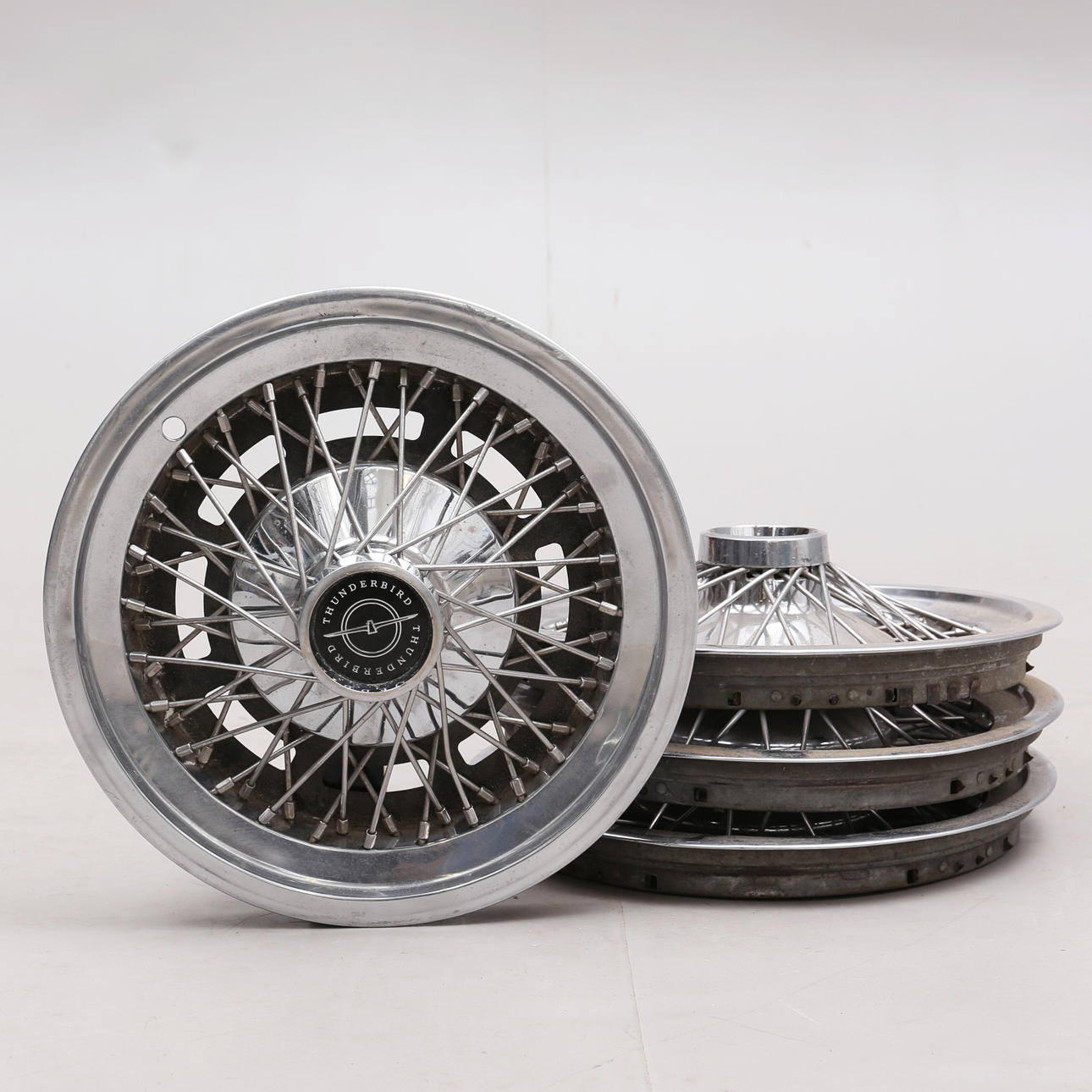 NAVKAPSLAR, Thunderbird, 4 st, "eker-fälgar", 1900-talets mitt.