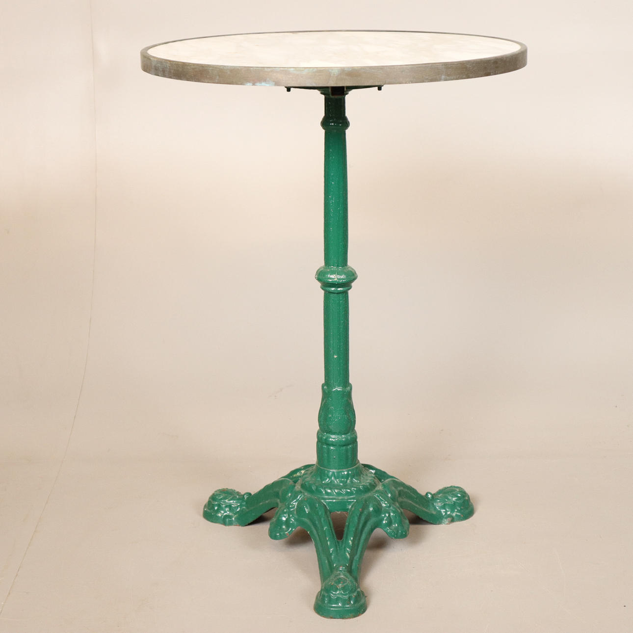 PILLAR TABLE cast iron with marble top.