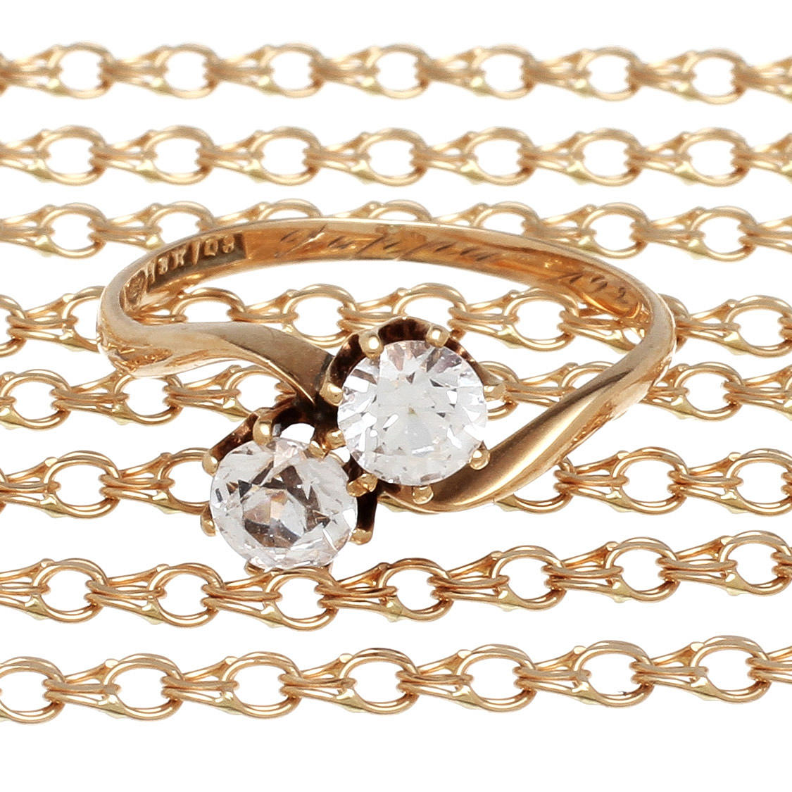 SMYCKEN, 2 delar, 18K rödguld samt bergskristaller. Vikt 6,3g.