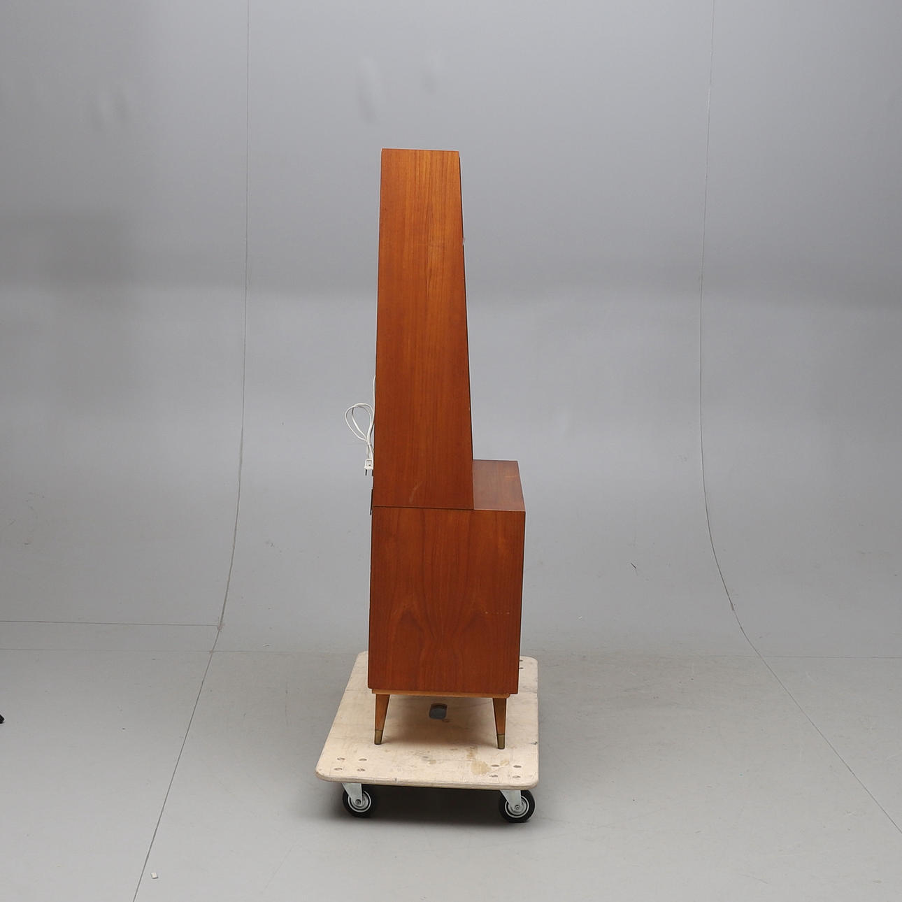 BOOK SHELF, with writing flap, veneered in teak, around the middle of ...