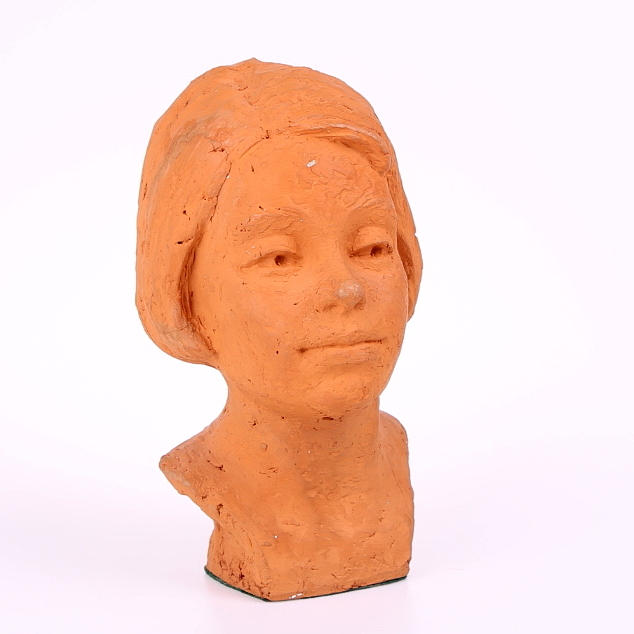 NILS CASTEGREN. Skulptur i terrakotta, flickhuvud, signerad och numrerad 1/30.