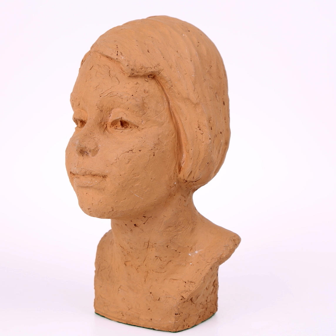 NILS CASTEGREN. Skulptur i terrakotta, flickhuvud, signerad.
