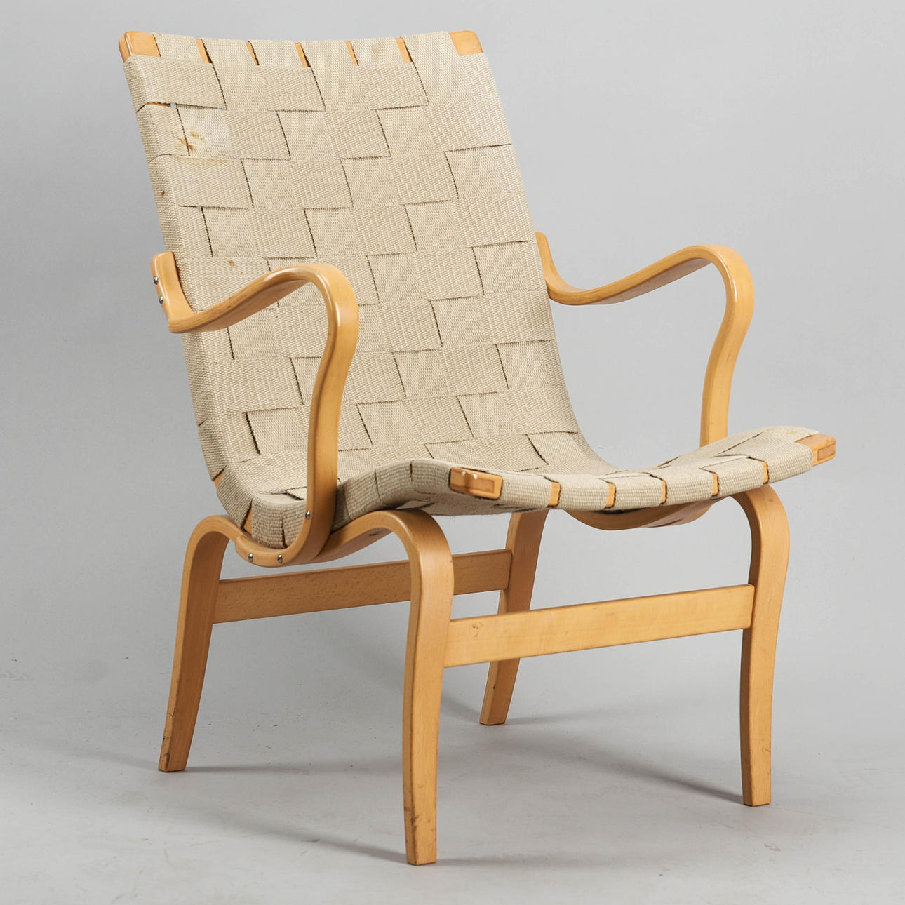 BRUNO MATHSSON. Armchair "Eva", beech, saddle girth, DUX.