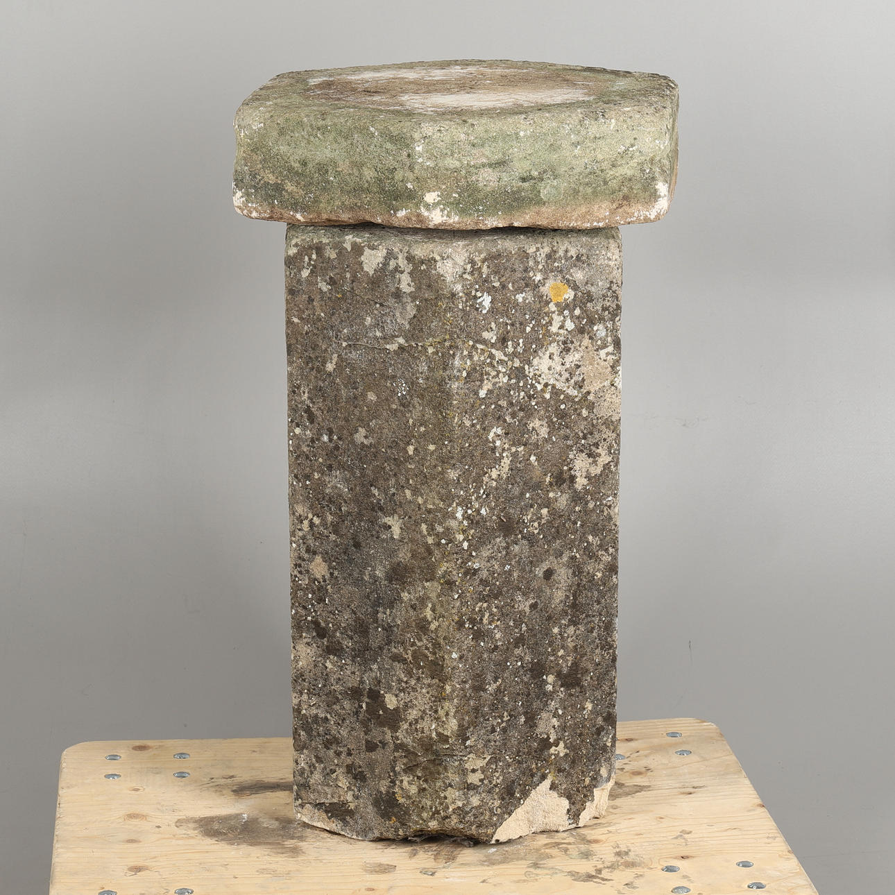 A CUT SANDSTONE HEXAGONAL COLUMN & TOP.