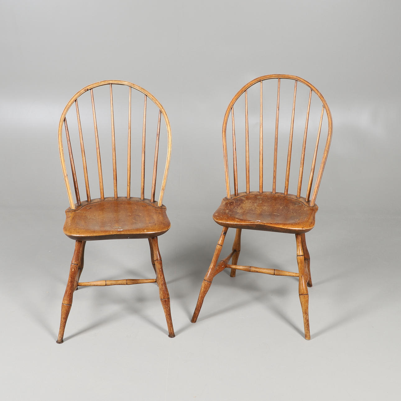 A PAIR OF AMERICAN HOOP BACK CHAIRS.