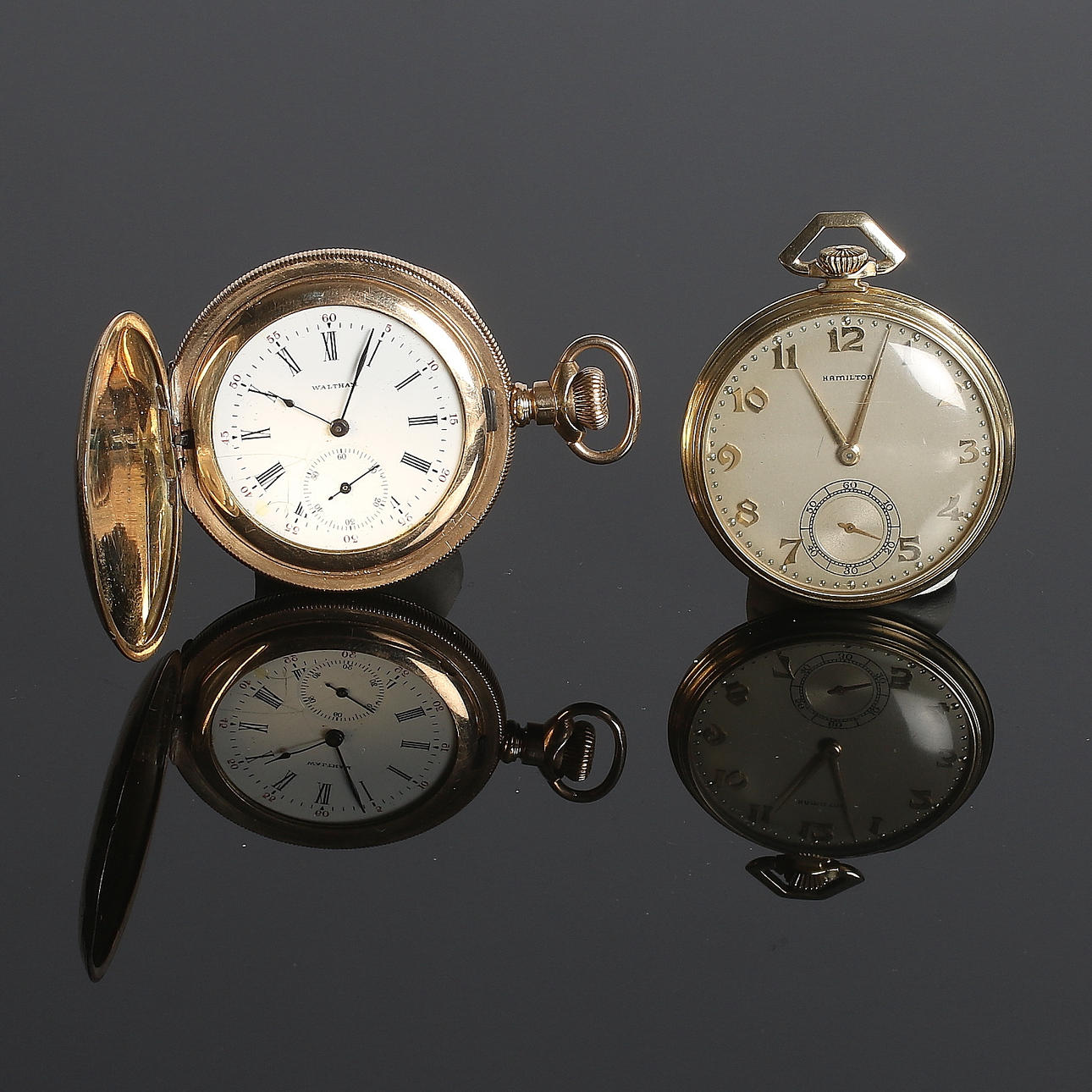 JAKTUR, Waltham, samt FICKUR, Hamilton, guld double, 1900-talets första halva.