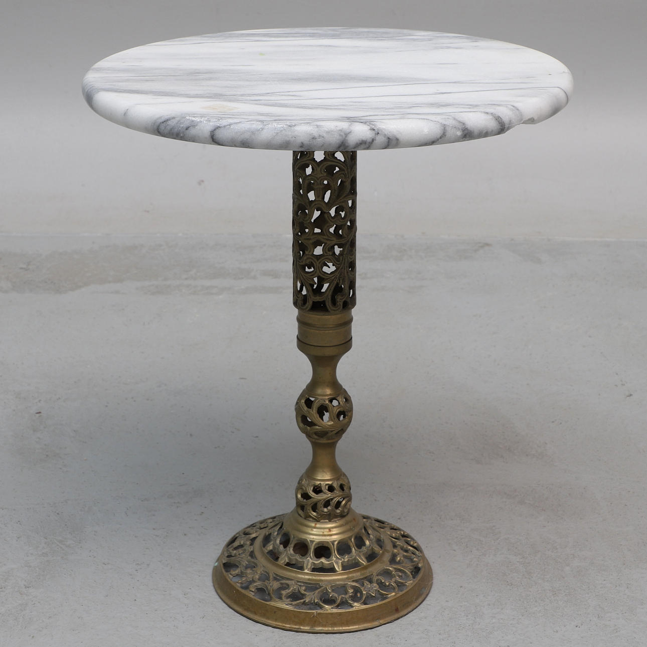 PILLAR TABLE, brass base with stone top, 1900s.
