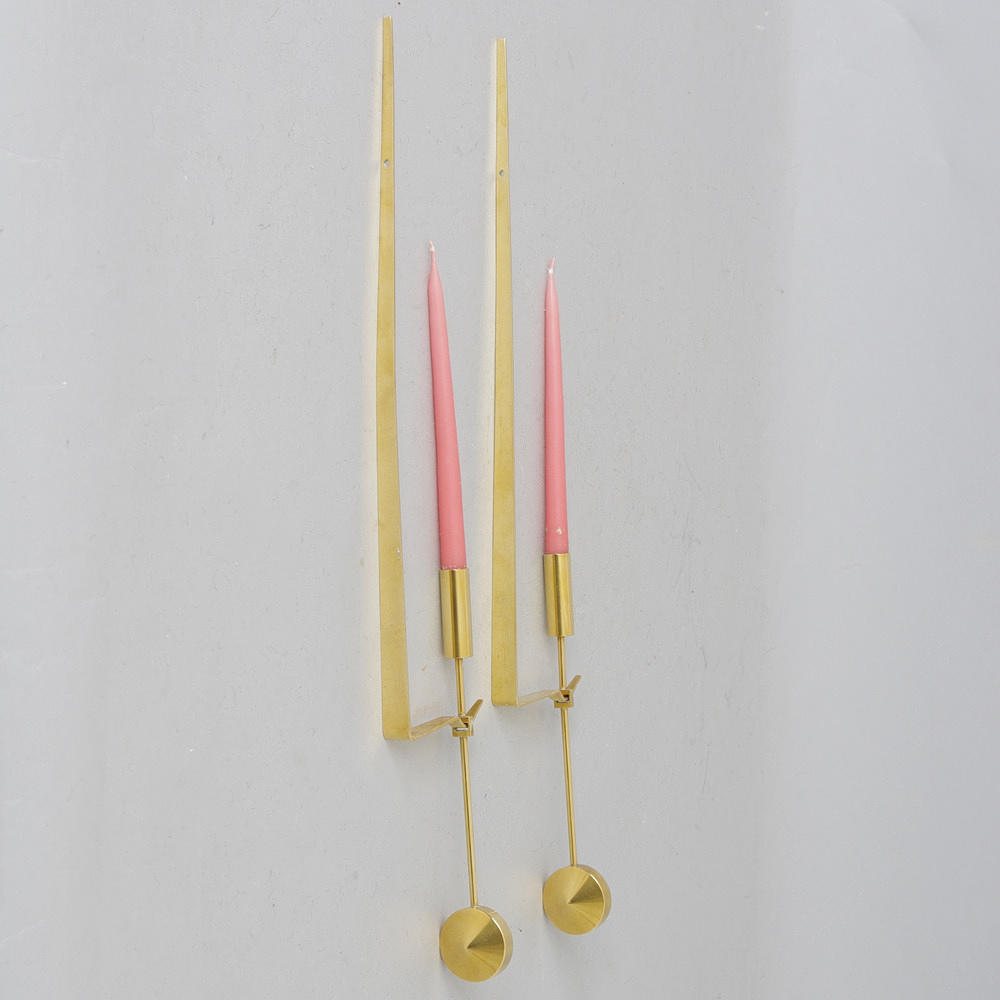 VÄGGLJUSSTAKAR, 1 par, mässing, "Pendel", Pierre Forsell, Skultuna.