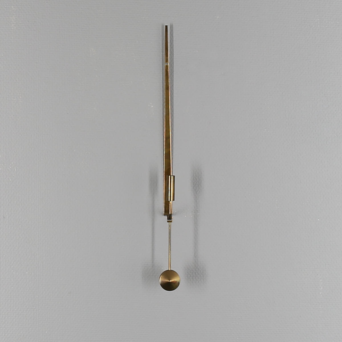 VÄGGLJUSSTAKE, mässing, "Pendel", Pierre Forsell, Skultuna.