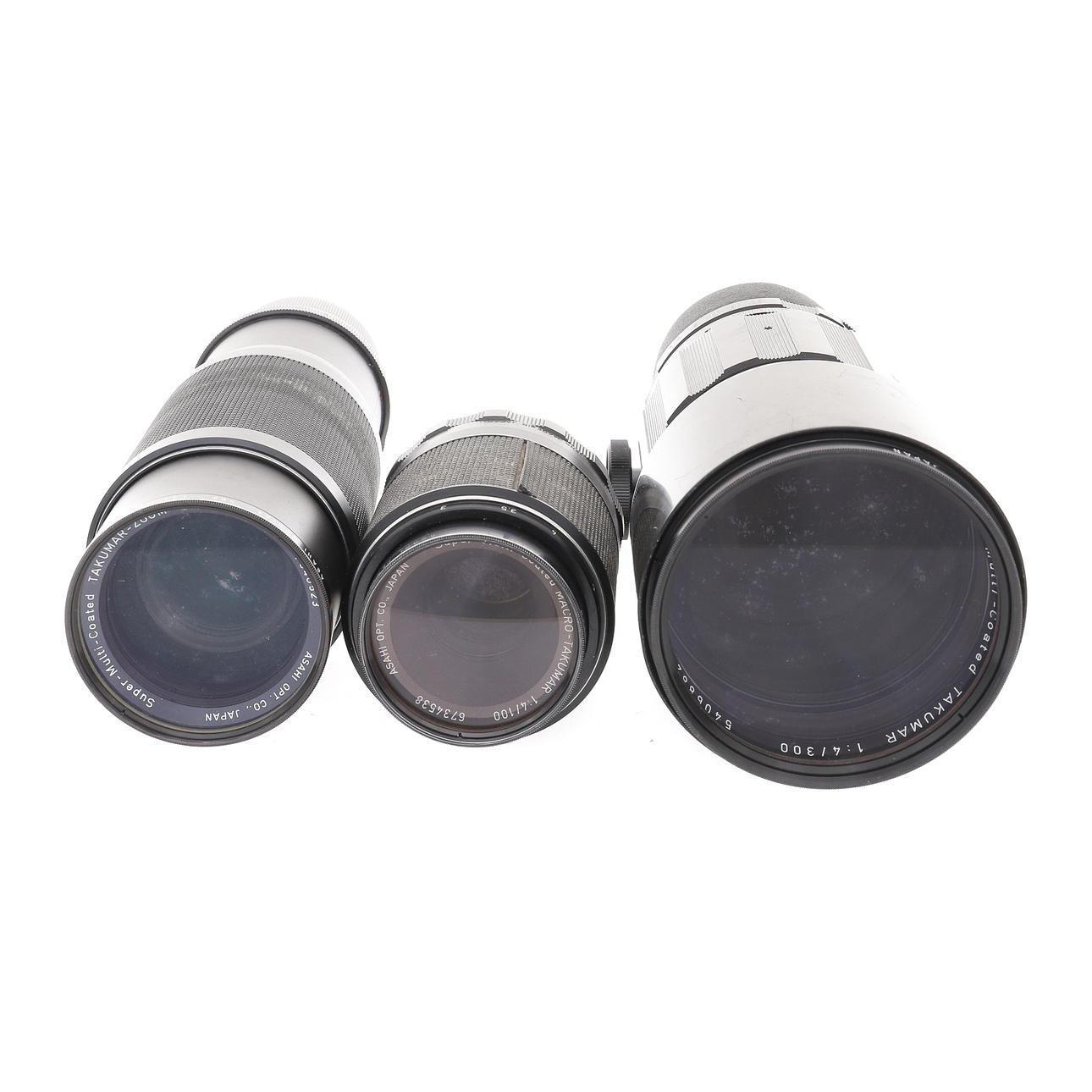EN GRUPP VINTAGE ASAHI PENTAX TAKUMAR LINSER.