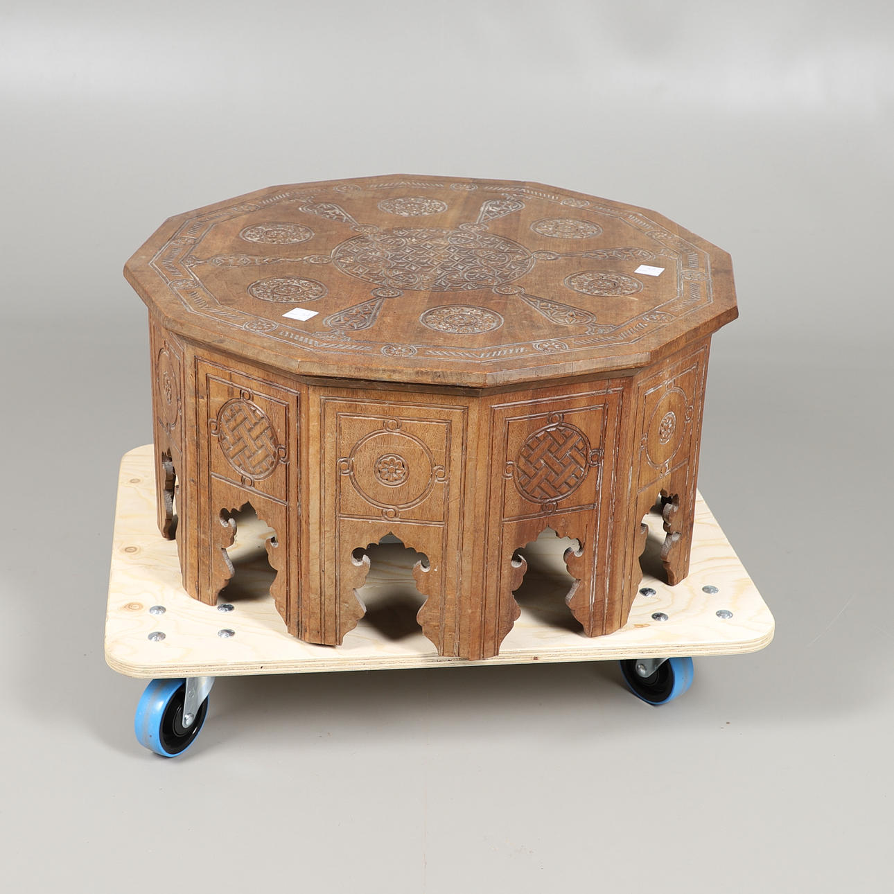 DUODECINAL CARVED LOW COFFEE TABLE.