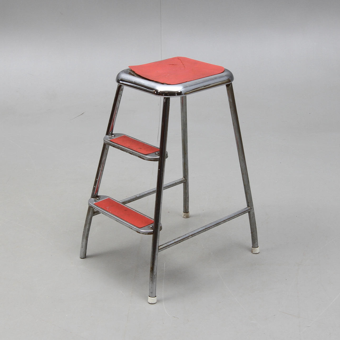 STEGPALL, etikettmärkt AWAB, 1900-tal.