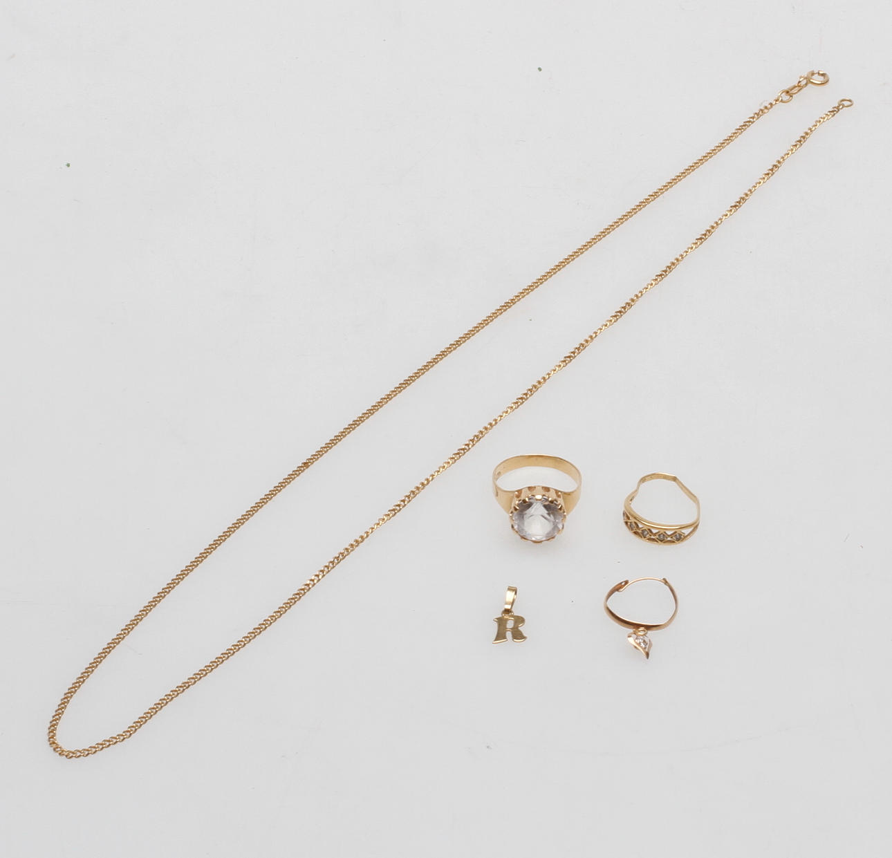 GULDSMYCKEN, 18k guld, total vikt ca 9,3 gr.