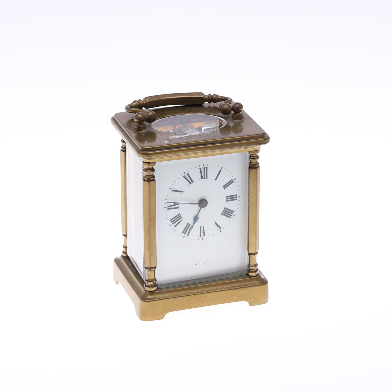 RELOJ CARRO DE LATÓN CON LLAVE.