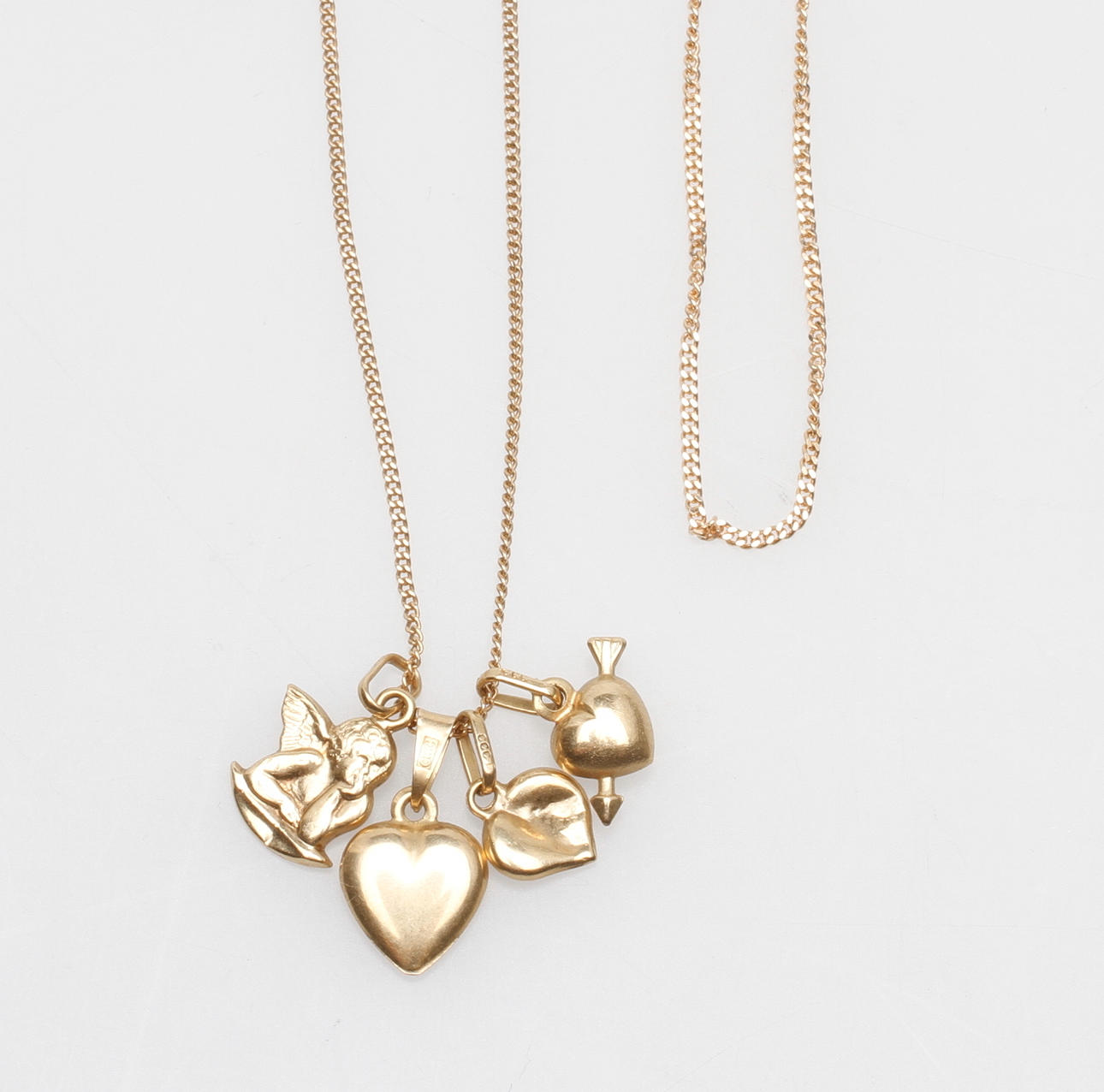 GULDSMYCKEN, 18k guld, vikt ca 7,2 gr.