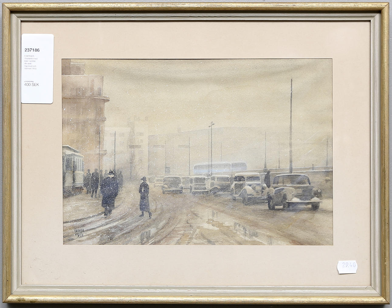 HAERNER. Stadsbild med bilar i snöfall. Akvarell. Signerad och daterad 1952.