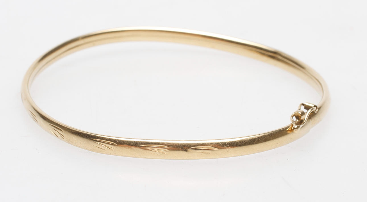 STEL ARMRING, 18k guld, vikt ca 6,6 gr.