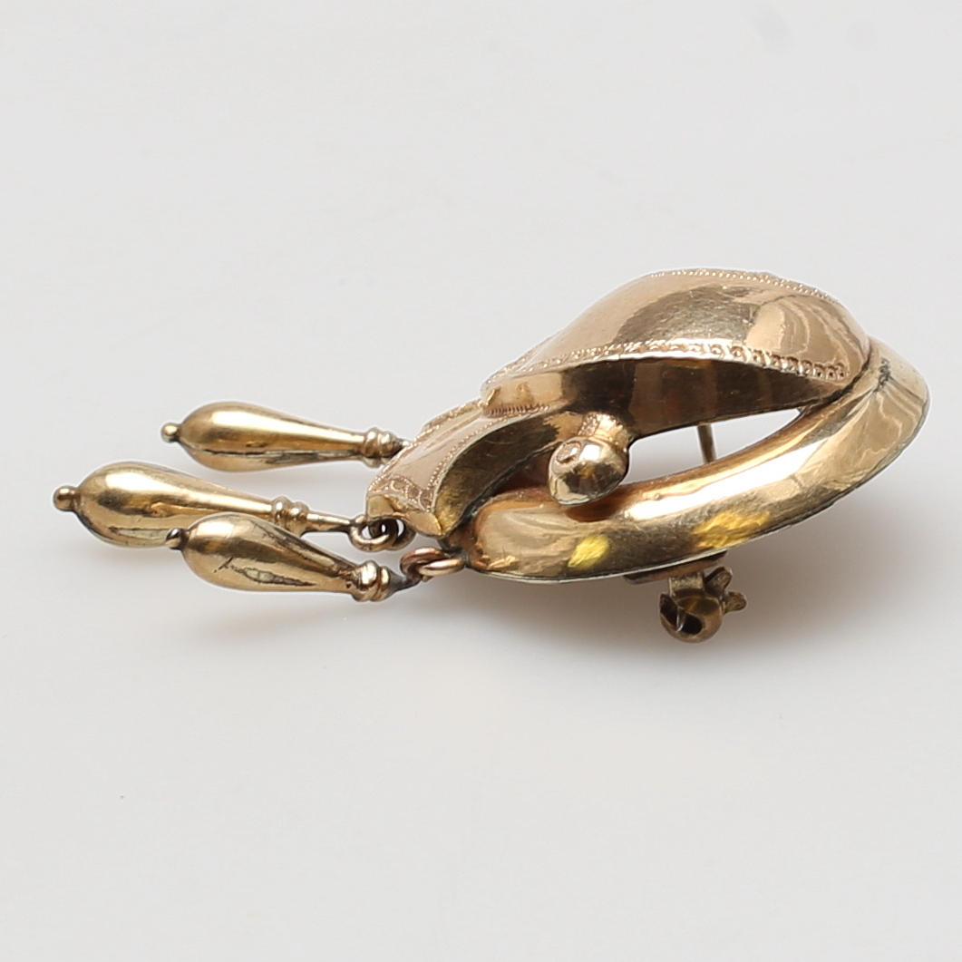 BROSCH i 14K guld. 1980-tal.