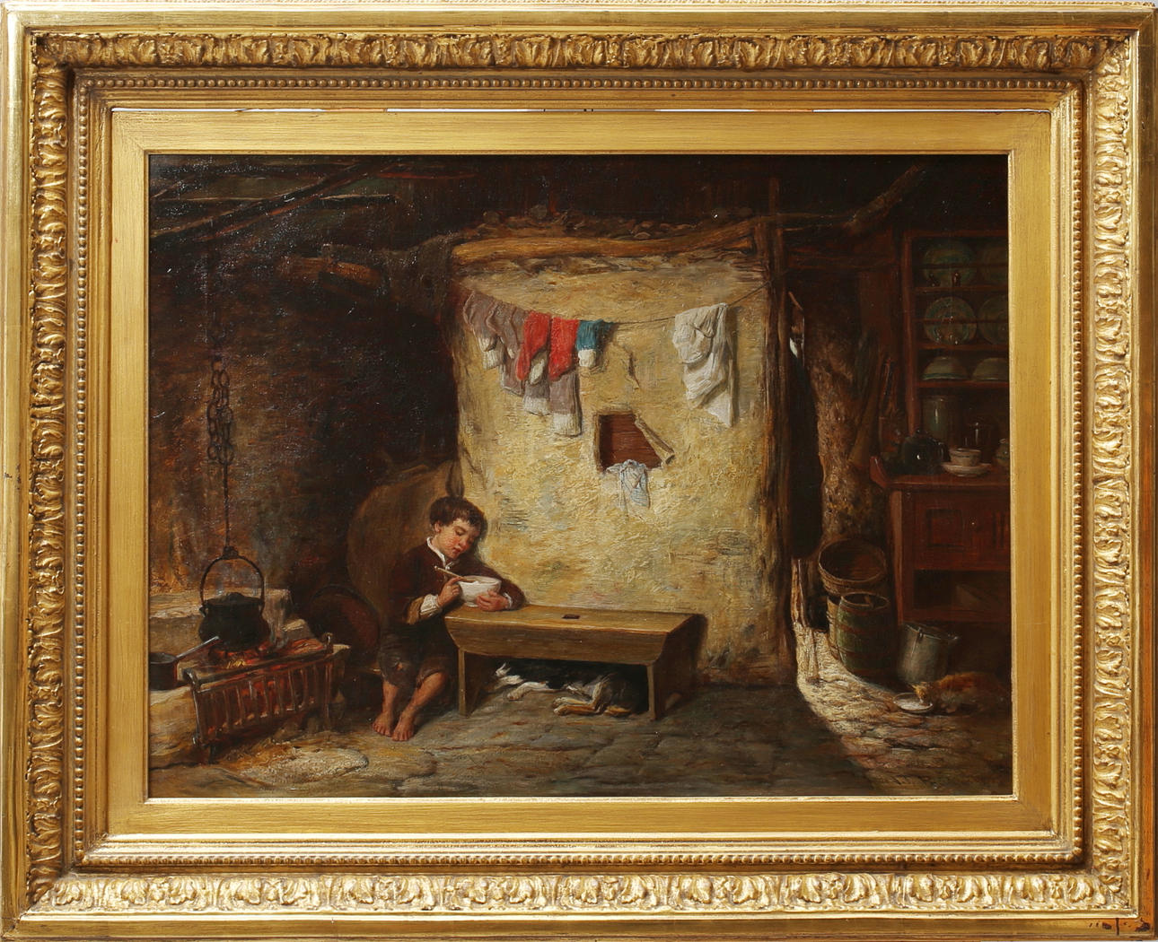 JOHN THOMAS PEELE (1822 PETERBOROUGH- LONDON 1897). Hus interiör med pojke äta soppa, hund sover vid hans fötter och katt på dricksskålen.