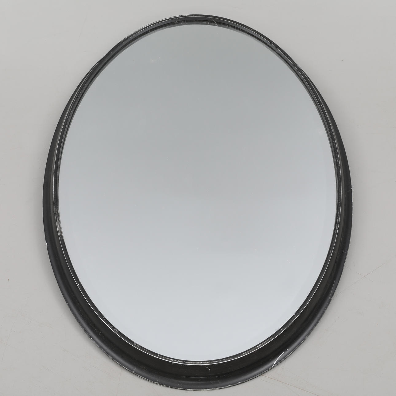 OVAL MIRROR, metal frame, black, 20th century.