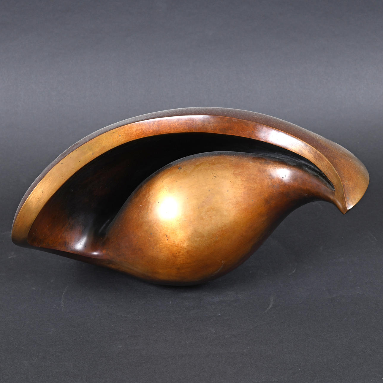 WENDY ANN TAYLOR CBE (B 1945) - LARGE BRONZE SCULPTURE, 'SHELL FORM'.