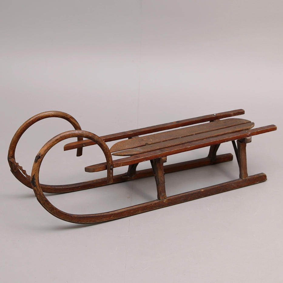 KÄLKE trä/metall, etikettmärkt, 1900-talets första hälft.