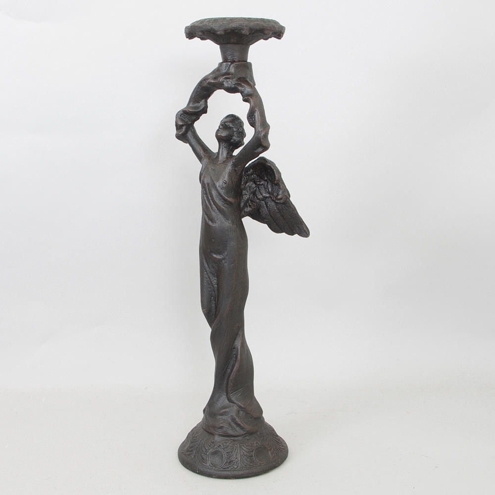 LJUSSTAKE, i form av ängel, gjutjärn, samtida.