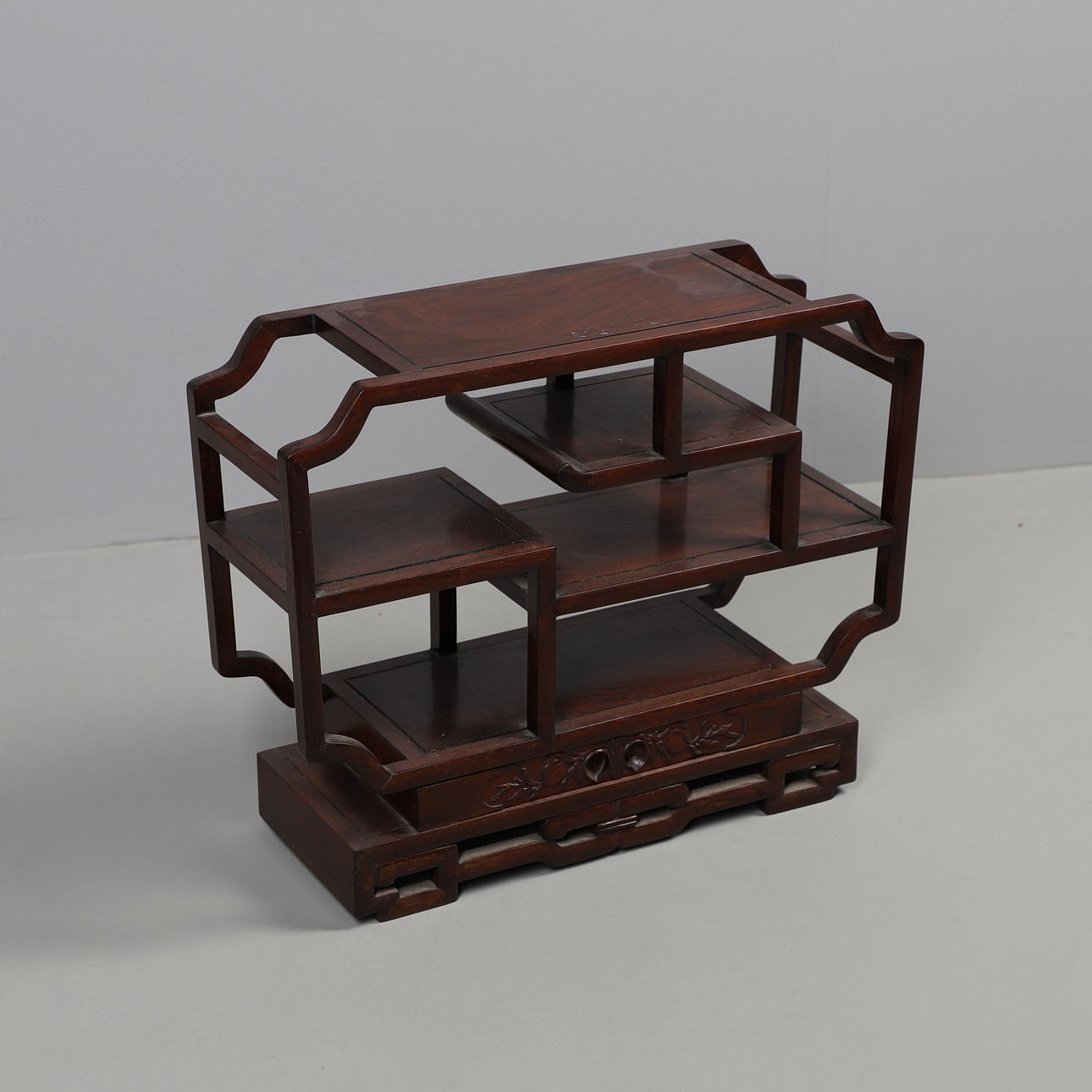 A CHINESE HARDWOOD DISPLAY STAND.