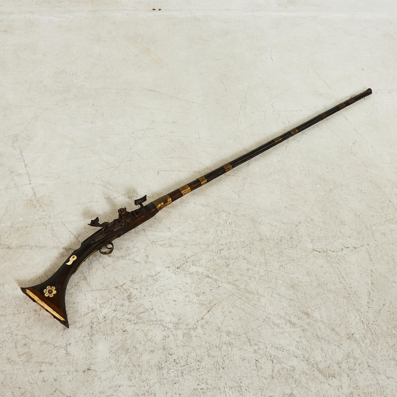 SNAP RIFLE, North Africa, 19th century, wood with bone inlays, brass ...