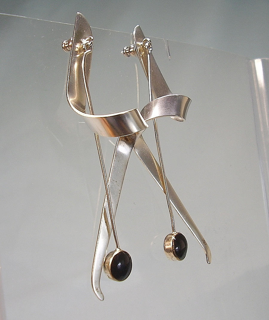 Sarah Harrison designer stud earrings with onyx.