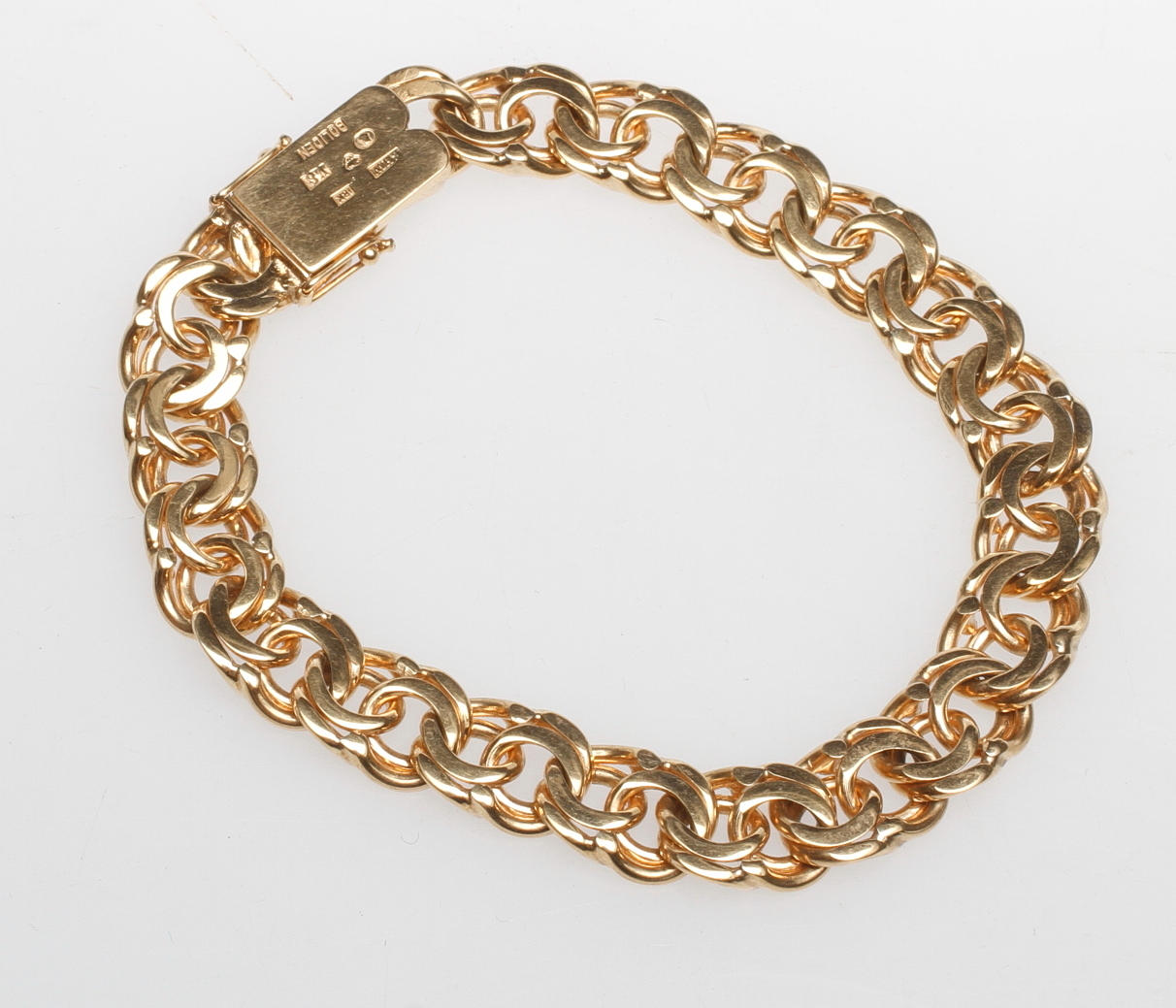 ARMBAND BISMARCK, Boliden 18k guld, vikt ca 48,7 gr.