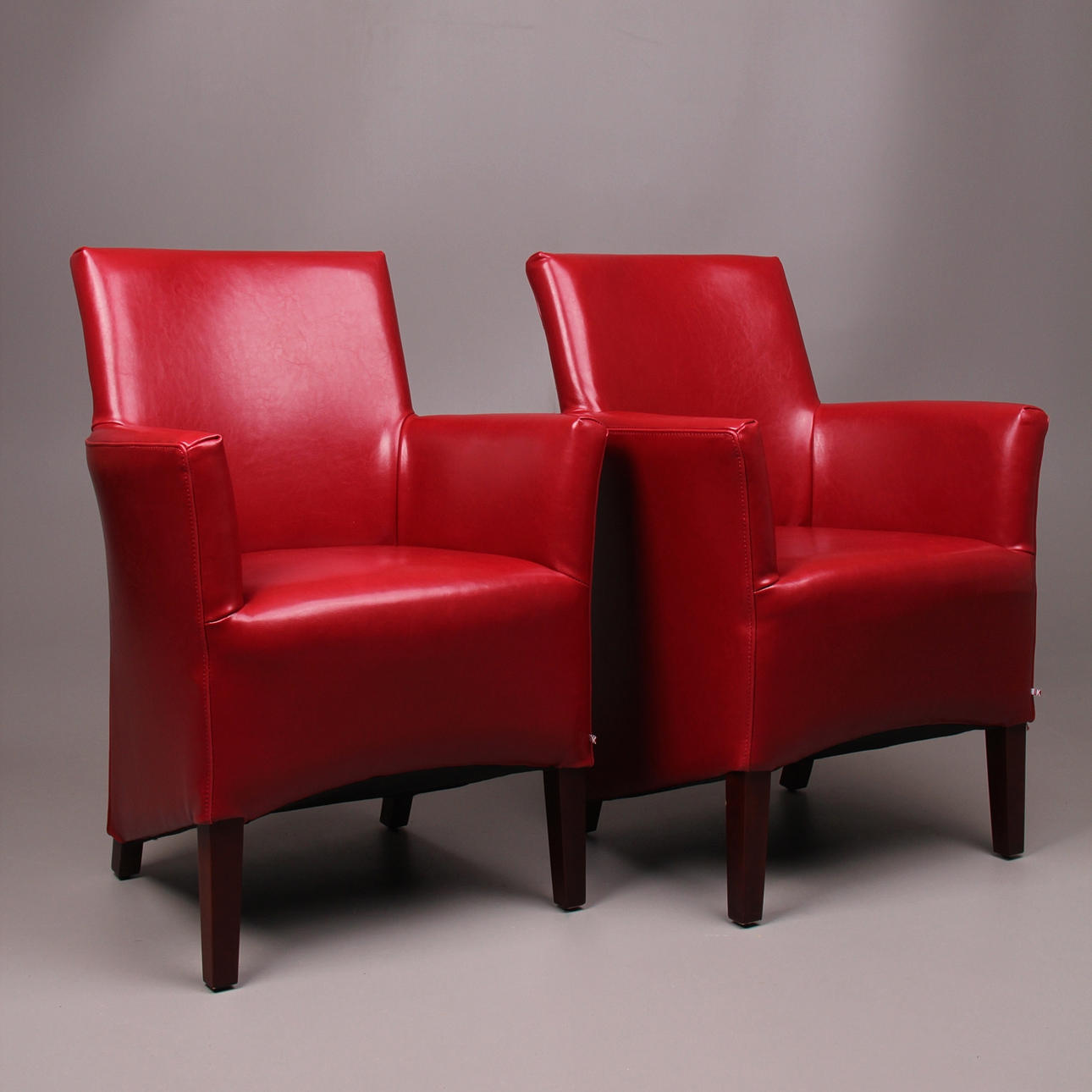 FÅTÖLJER, ett par, "Canon", Hans K, röd bycastläder, samtida.