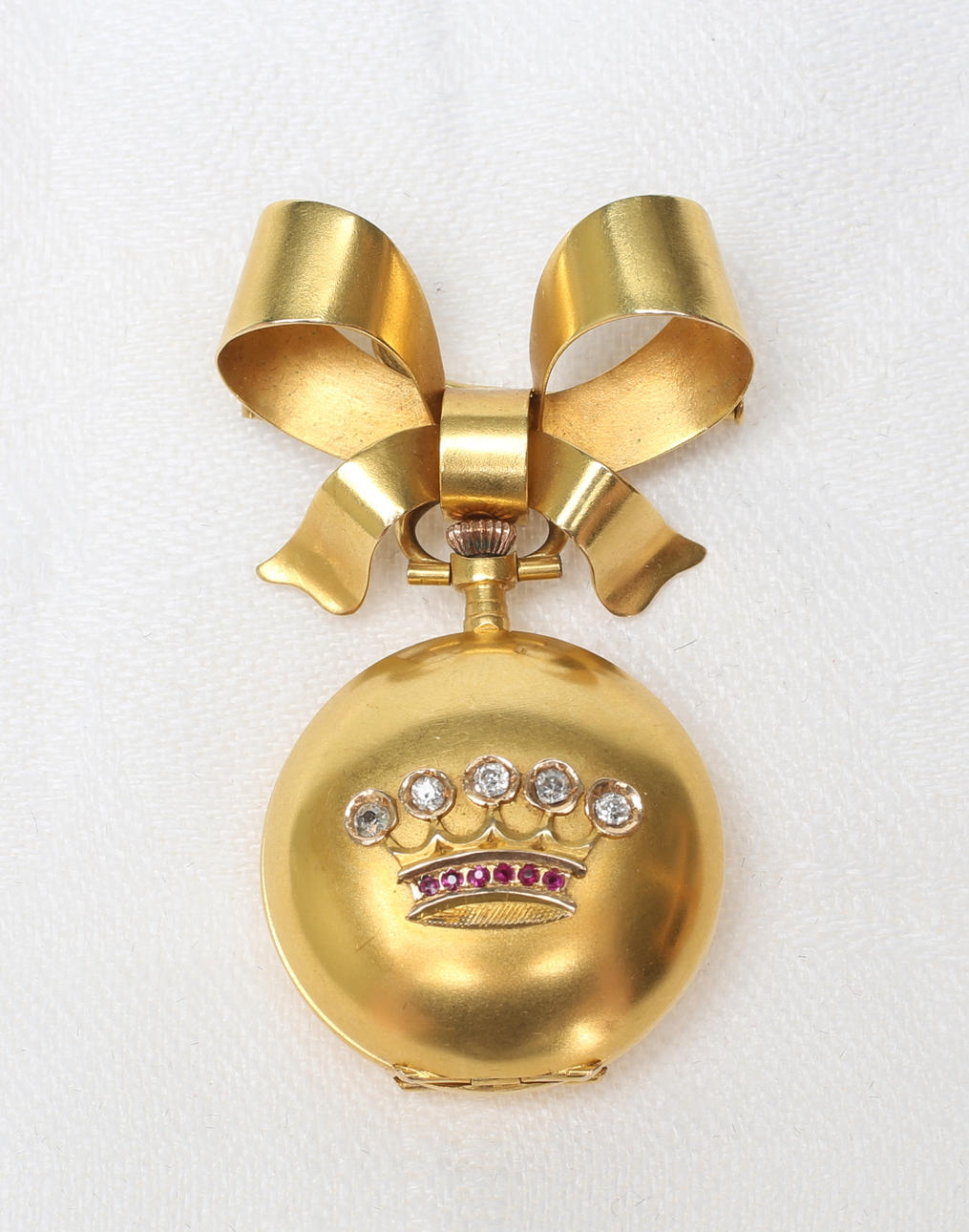 FICKUR, Apollo, 14 karat samt brosch 18 karat.