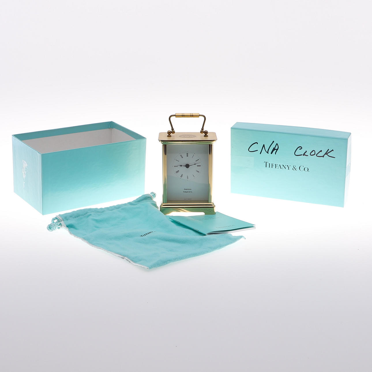 A TIFFANY & CO BRASS CARRIAGE CLOCK.