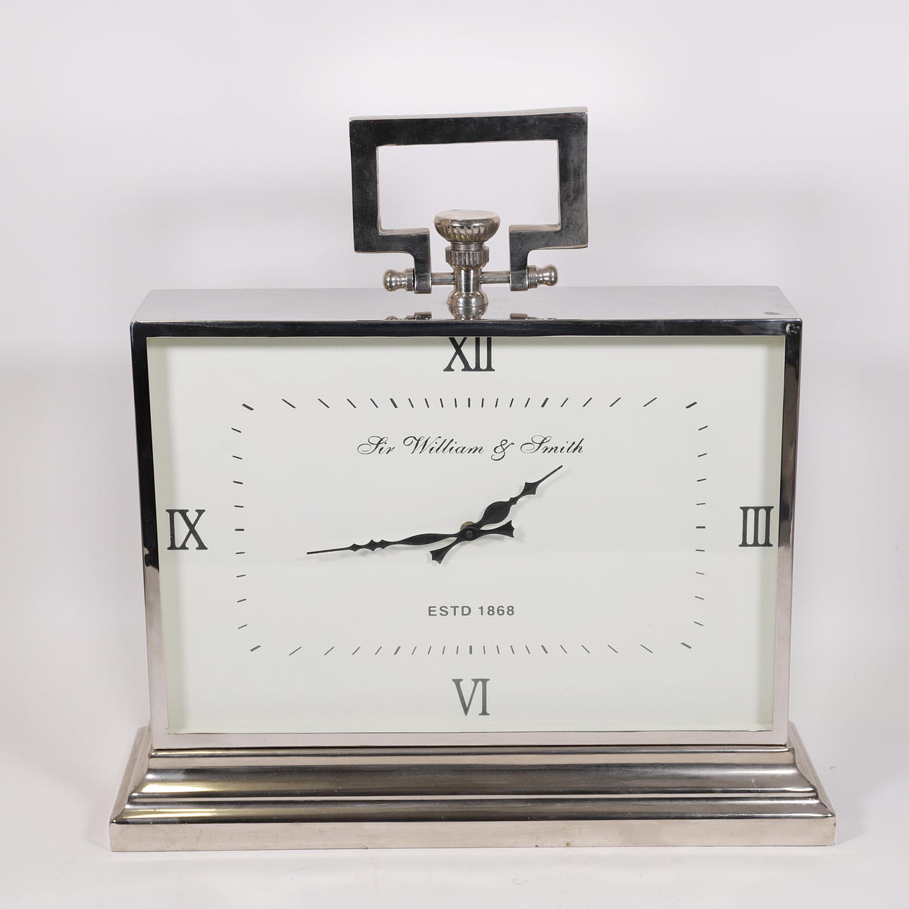 LOISTAVA TYÖPÖYDÄN KELLO. KROMATTU METALLI.