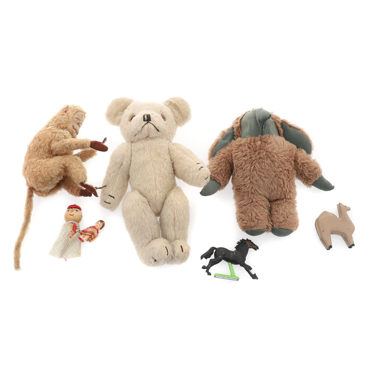 A VINTAGE STUFFED TOY MONKEY.