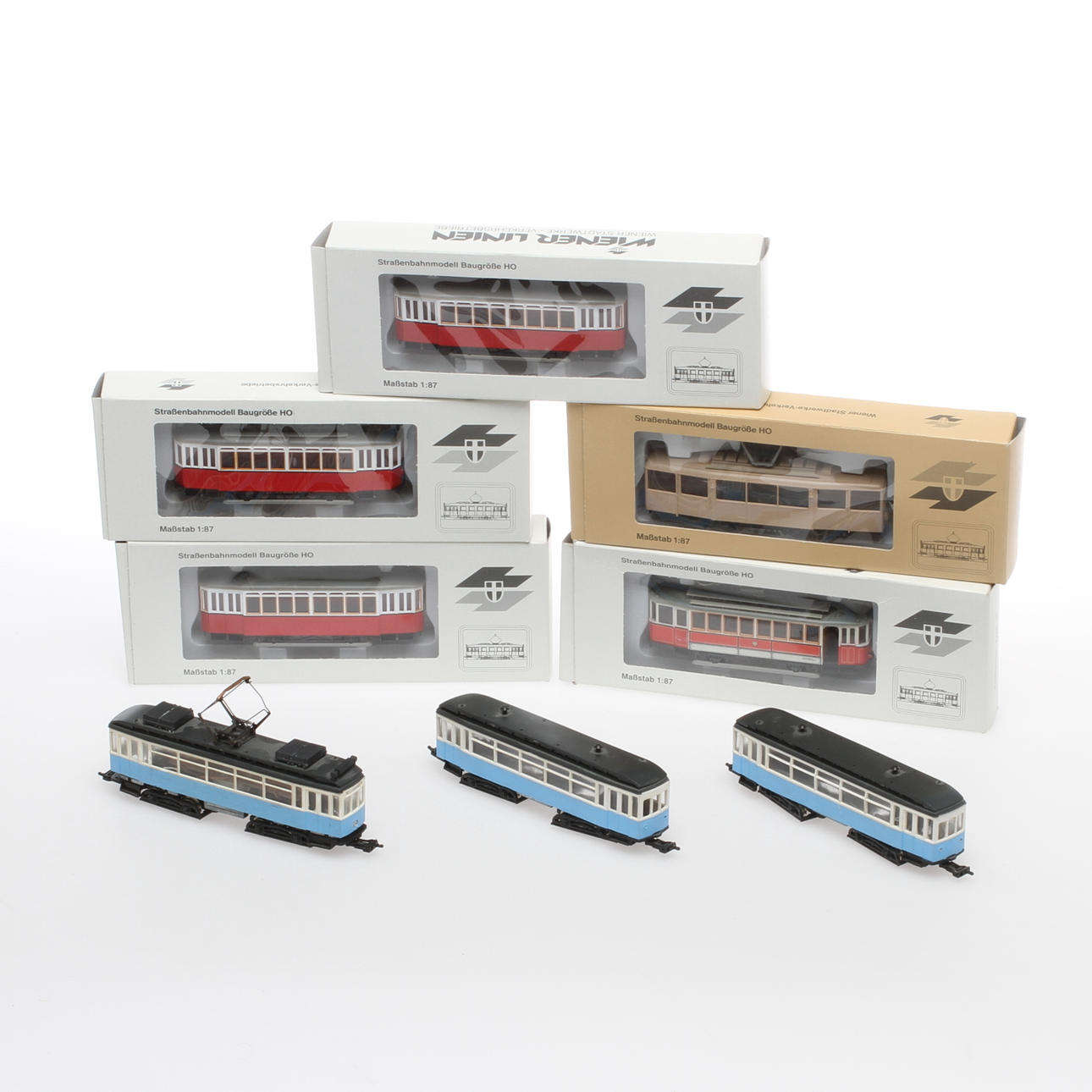 MODELLTÅG SPÅRVAGNAR . 1 motorvagn och 7 släp. Delvis originalkartong.