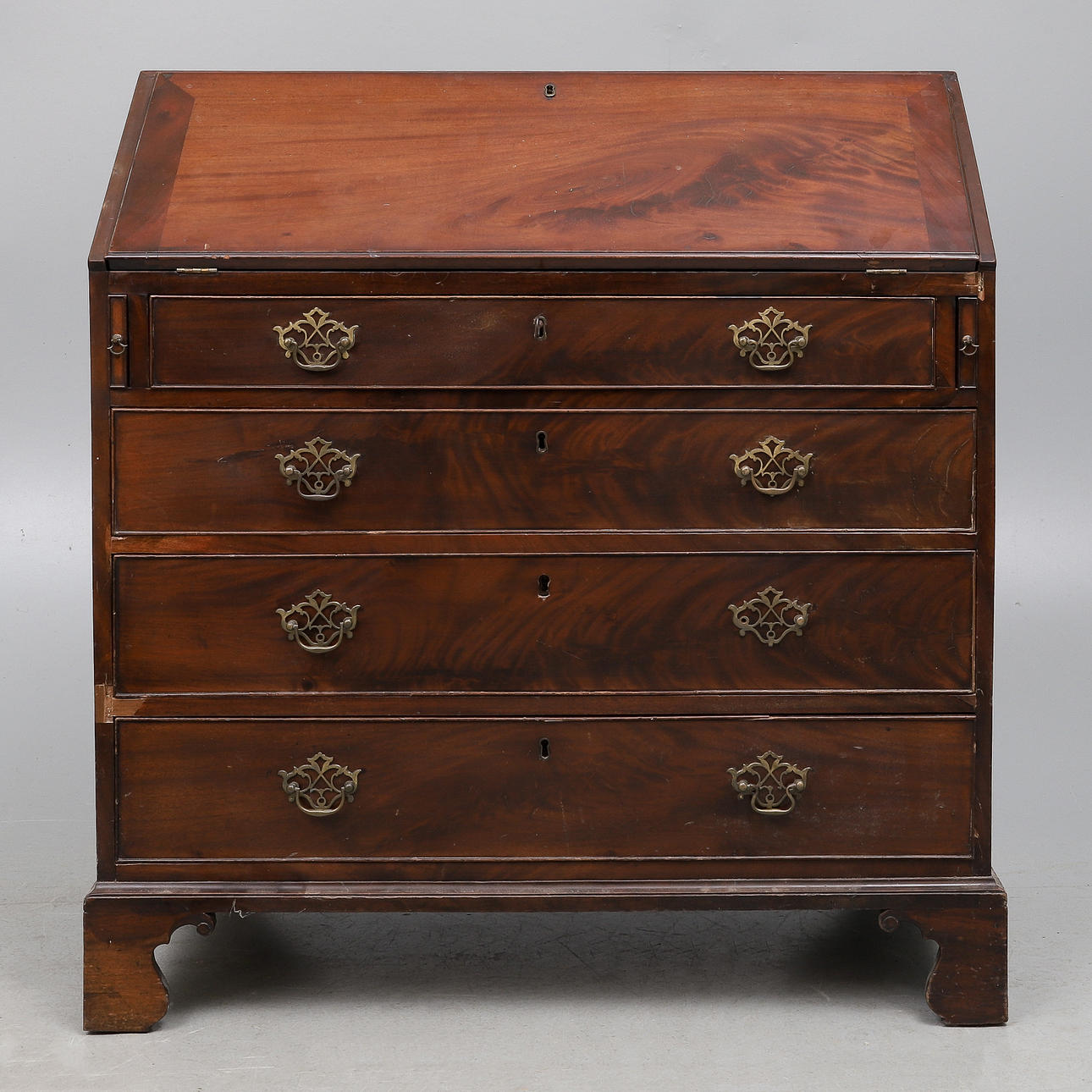 A GEORGE III MAHOGANY BUREAU.