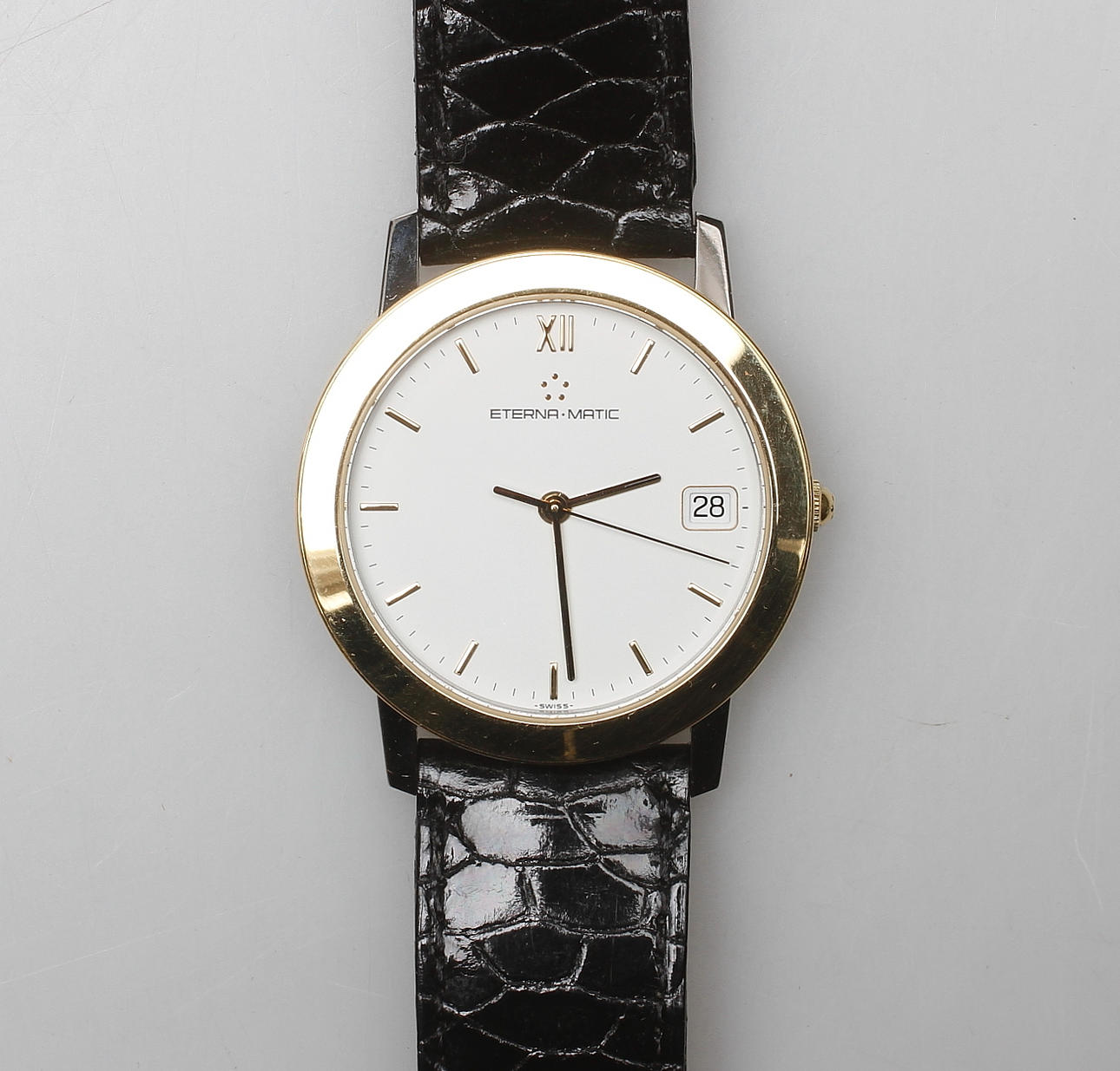 HERRARMBANDSUR, Eterna (Eterna-matic), guld 18k samt stål, automatic. 1980-tal.