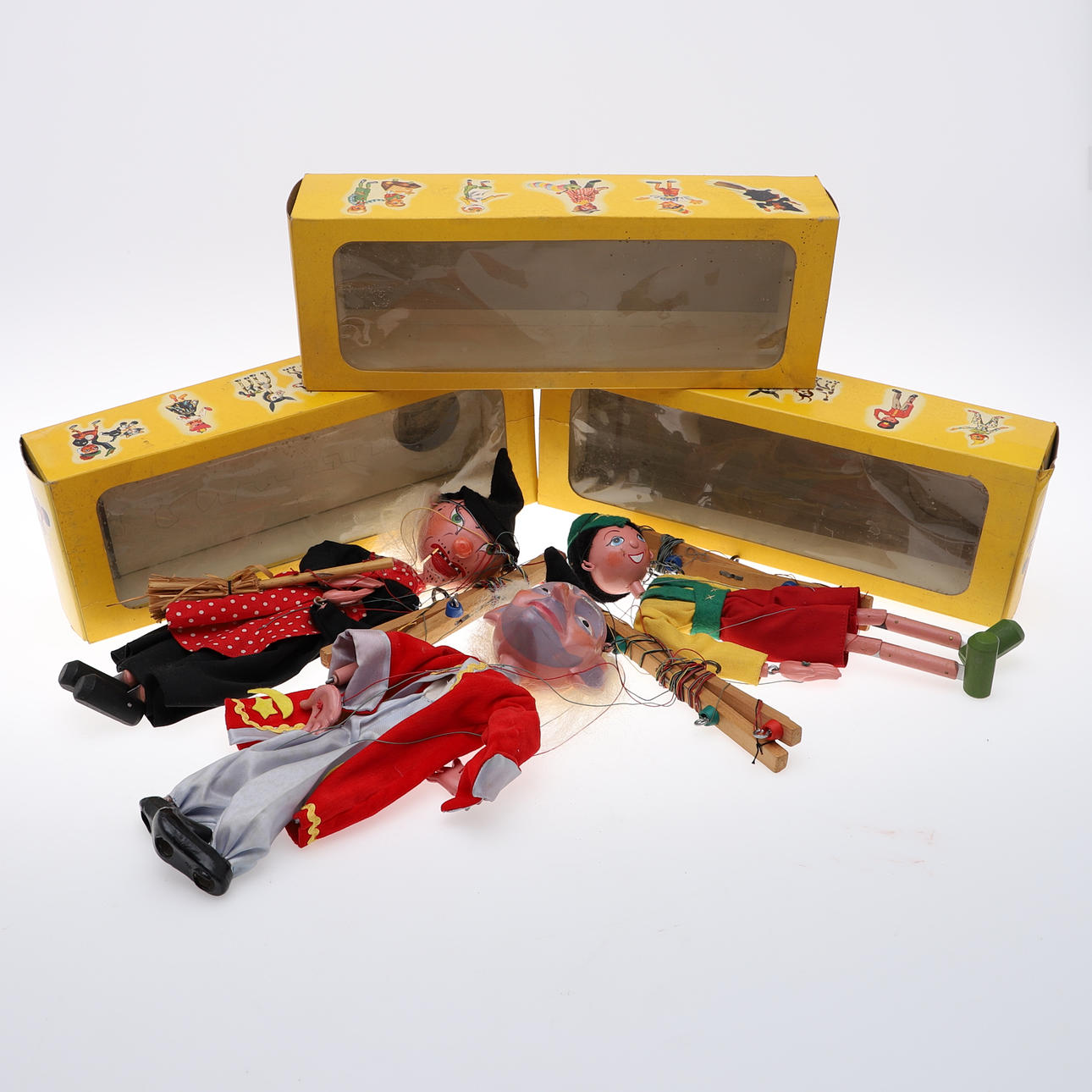 THREE PELHAM PUPPETS IN WINDOW BOXES.