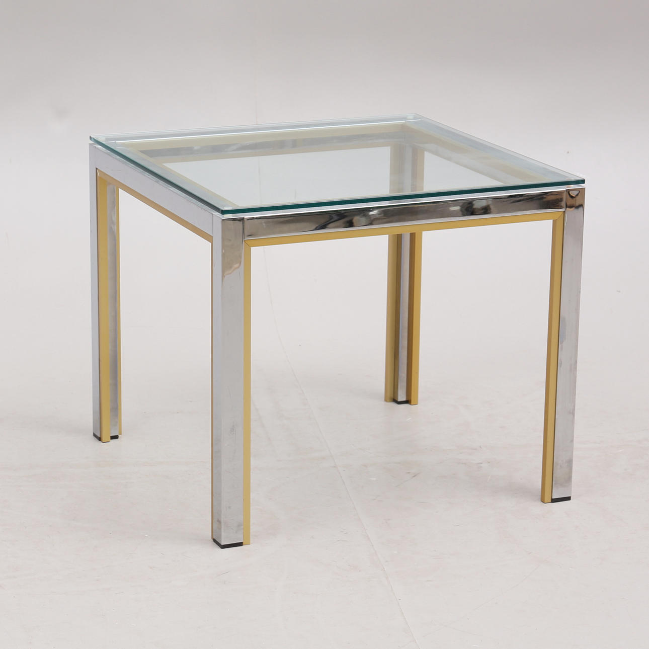 SIDE TABLE, glass, chrome and brass, late 20th century.