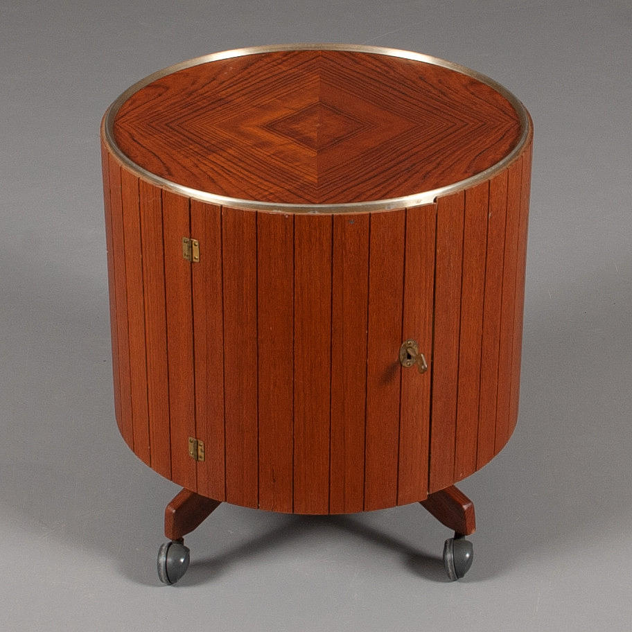 BAR TABLE, cylinder format, teak, mid-20th century.