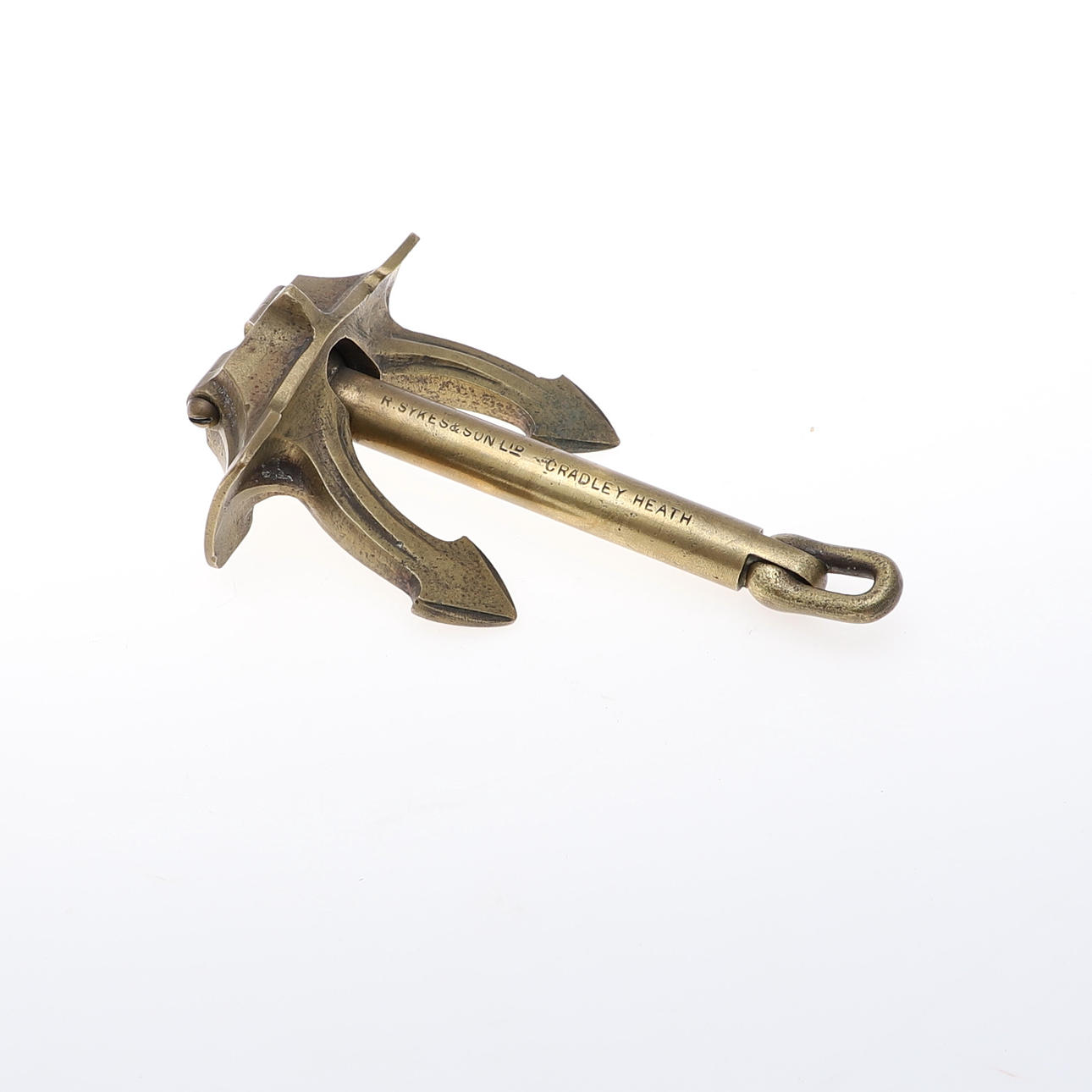 A BRASS IMPROVED BRITANNIC ANCHOR.