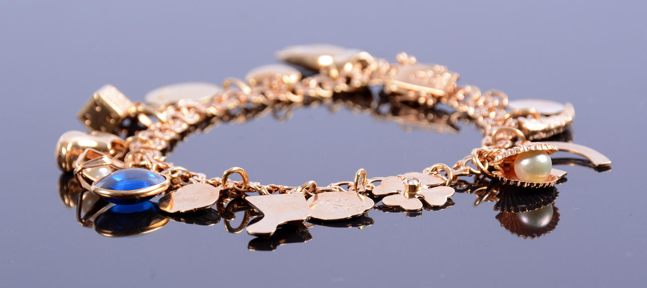 ARMÄNK MED BERLOCKER, bissmark, 18K, guld.