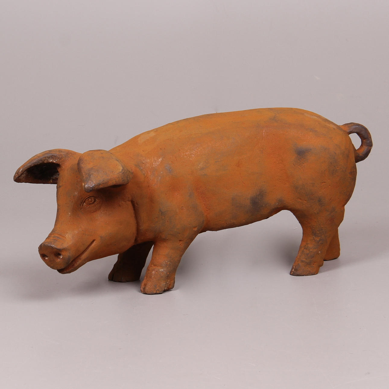 GRIS, gjutjärn, rostpatinerad, samtida, längd ca 60 cm.