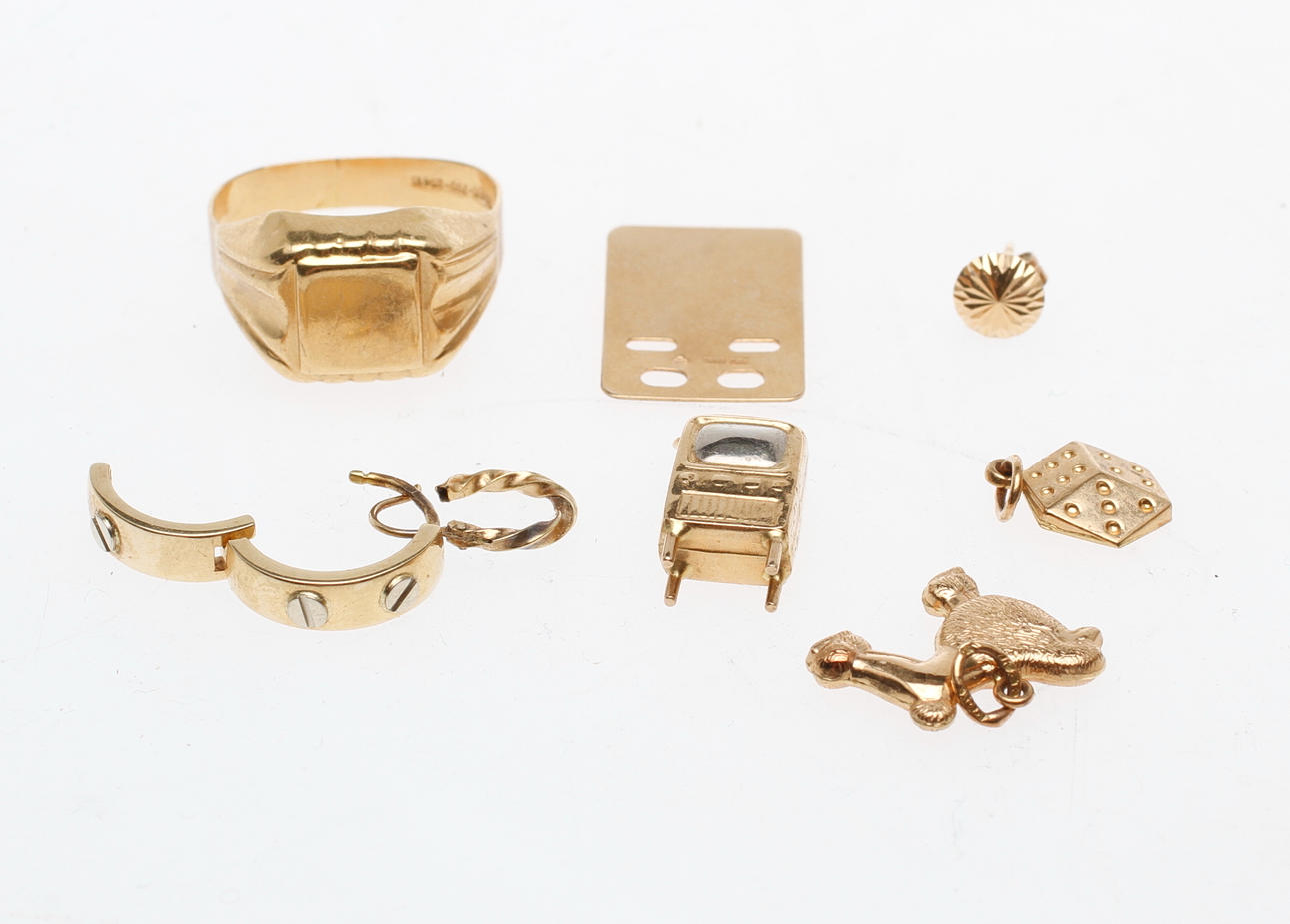 GULDSMYCKEN, 18k guld, vikt ca 9,4 gr.